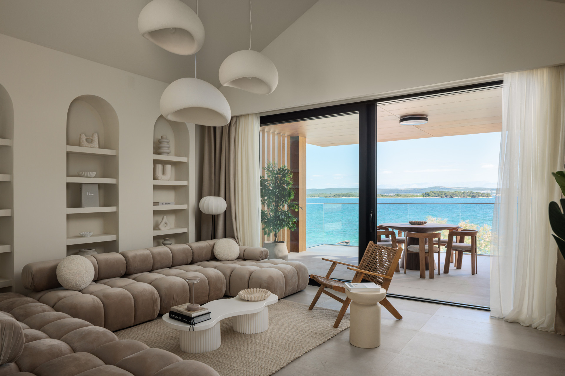 Living room with arched shelves