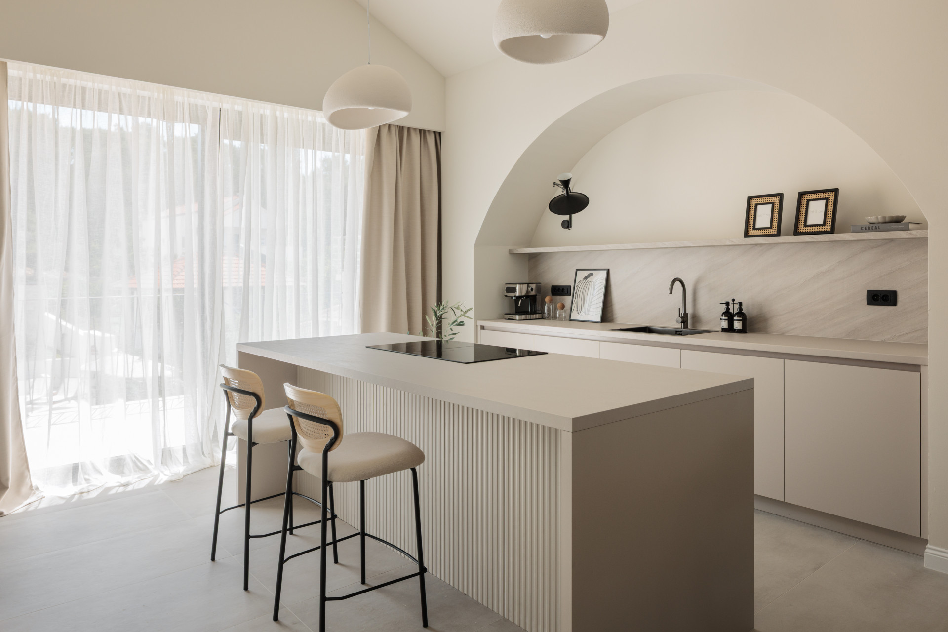 Modern kitchen with arched detail