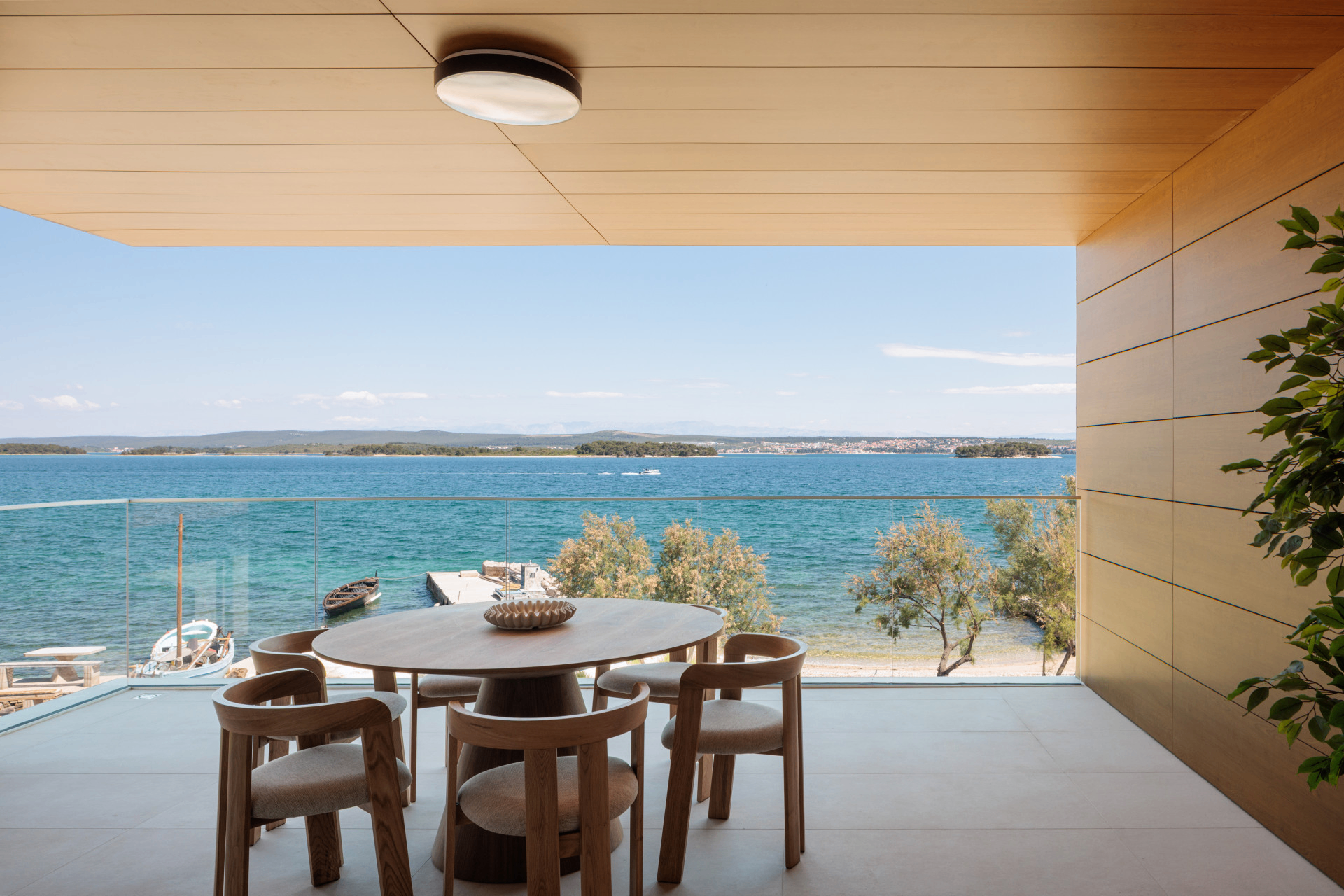 Villa Casa NoTa terrace dining with sea view
